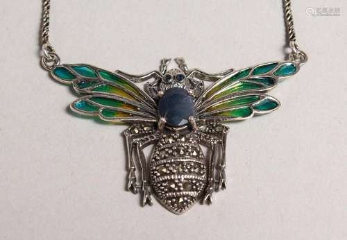 A SILVER SAPPHIRE SET BEE PENDANT on chain.