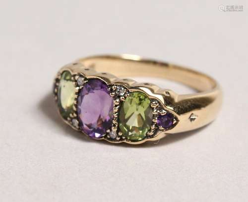 A 9CT GOLD, PERIDOT, AMETHYST AND DIAMOND RING.