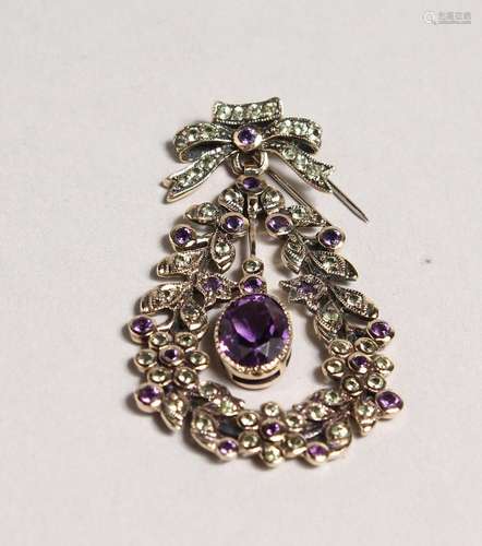 A 9CT GOLD, PERIDOT AND AMETHYST WREATH PENDANT.