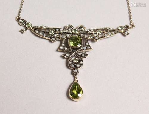 A 9CT GOLD, PERIDOT AND PEARL PENDANT on chain.