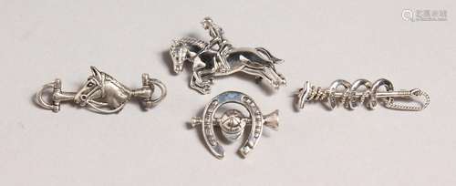 A SET OF FOUR SILVER HORSE RELATED PINS AND BROOCHES.