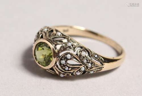 A 9CT GOLD, PERIDOT AND PEARL RING.