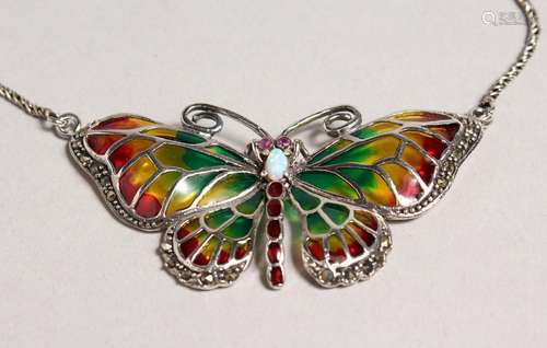 A SILVER, OPAL, RUBY PLIQUE BUTTERFLY PENDANT on a chain.