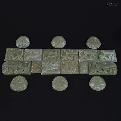 A Set of Eighteen Green Jade Pendant