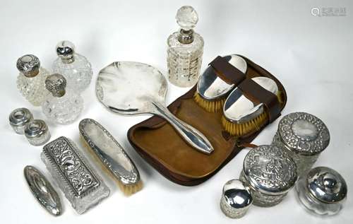 Four silver-mounted cut glass scent bottles