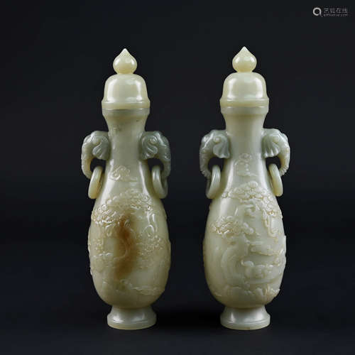 A Pair of Carved Khotan Jade Elephant Eared Flower Zun