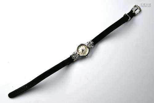 A lady's Benrus 14k white gold wristwatch