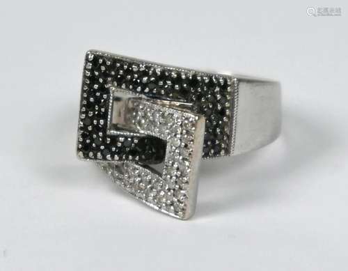 A diamond set geometric style ring