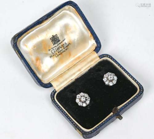 A pair of antique diamond cluster earrings