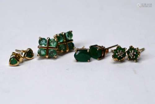 A collection of four pairs of emerald set earrings