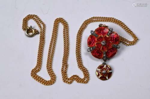 An antique red enamelled Tudor Rose