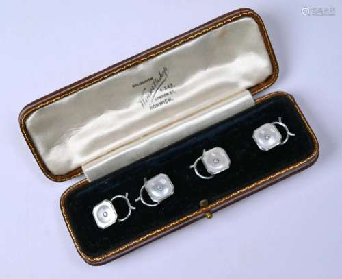 A cased set of four yellow and white metal diamond set