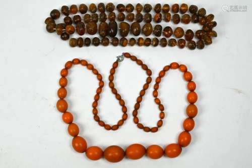 Two rows of differing Baltic amber beads