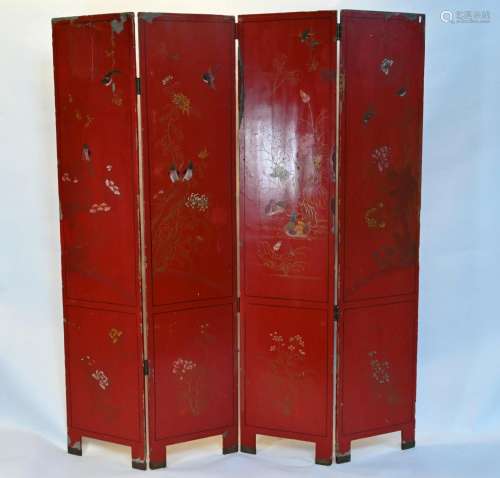 A late 19th century Chinese red lacquered screen