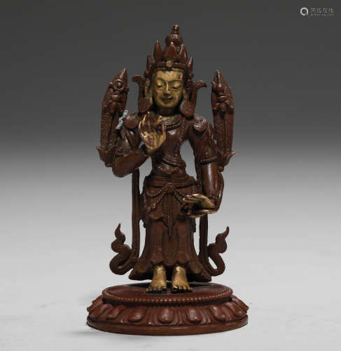 A QING DYNASTY COPPER STATUE