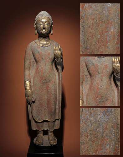 A NORTHERN QI QING ZHOU gold painted Buddha statue