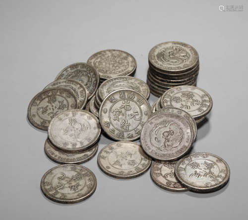SOME QING DYNASTY SILVER COINS