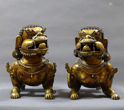 A Pair Of Bronze Roaring Lions