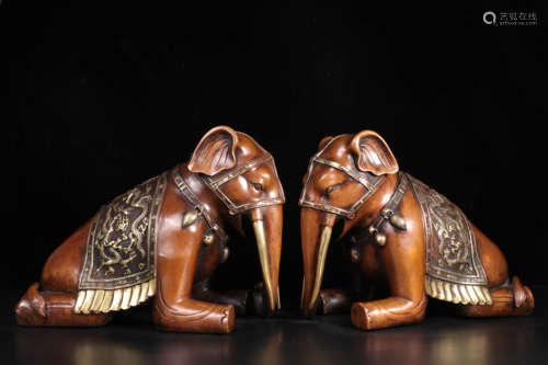 A Pair Of Bronze Elephants