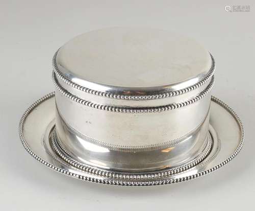 Silver cookie jar with saucer