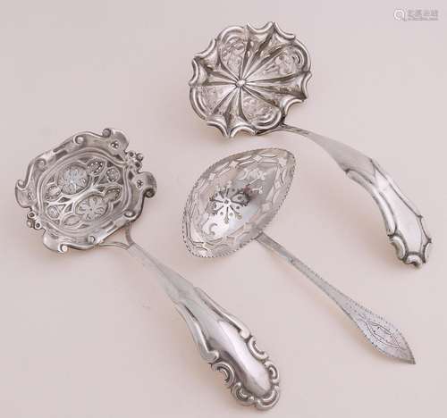 Three silver sprinkle spoons