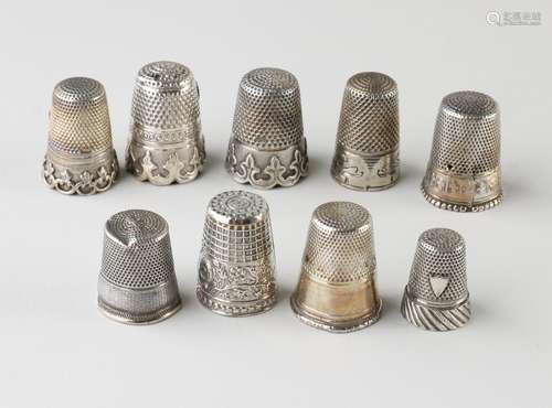 9 Silver Thimbles