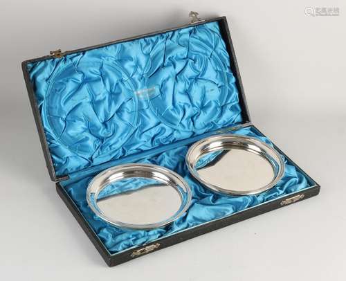 Set of silver bottle trays