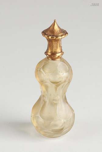 Odeur bottle with golden cap