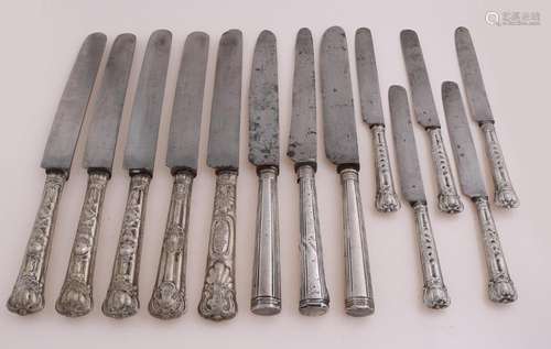 13 knives with silver