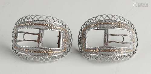 Two silver shoe buckles with gold