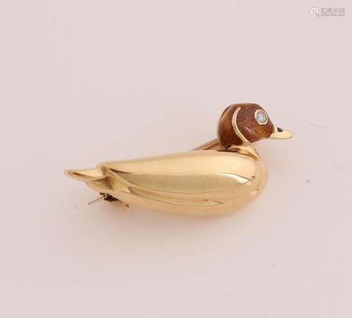 Golden brooch duck