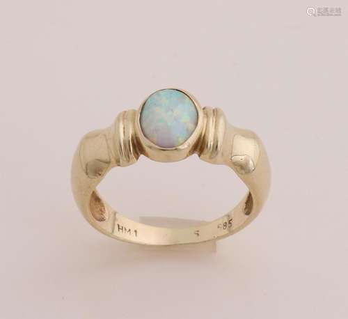 Gold ring with opal