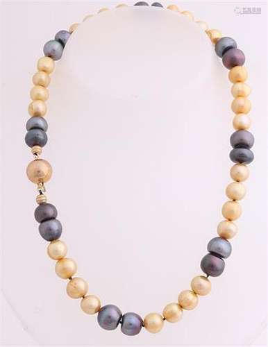 Necklace with black and yellow pearls and gold lock