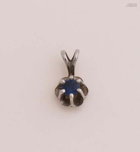 White gold pendant with sapphire