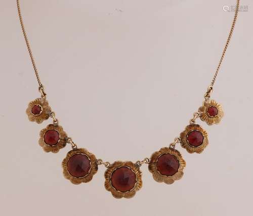 Gold choker with garnet