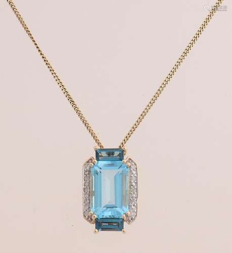 Gold necklace and pendant with blue topaz