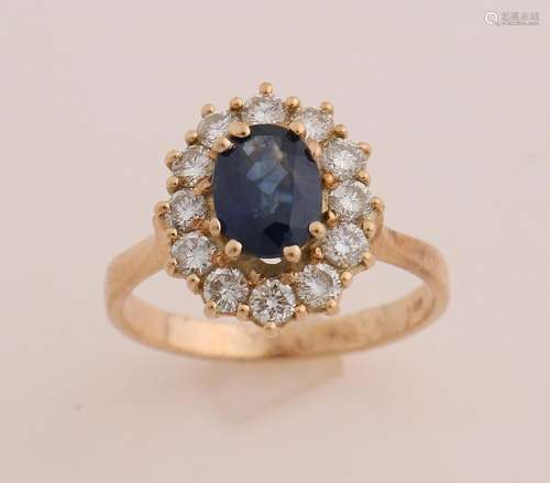 Gold entourage ring with diamond and sapphire