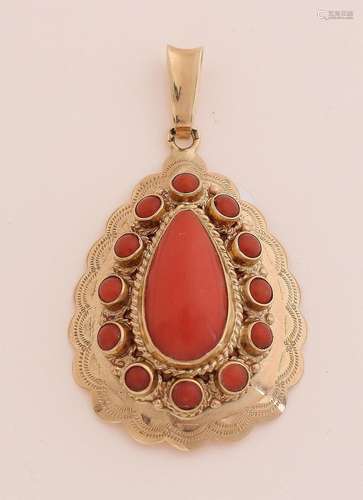 Gold pendant with red coral