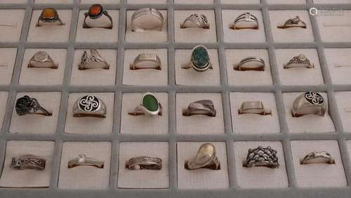 Lot with 24 silver rings