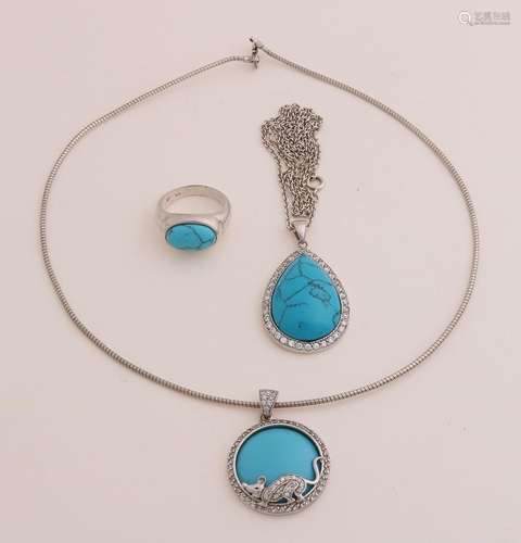 Three silver jewelry with turquoise.