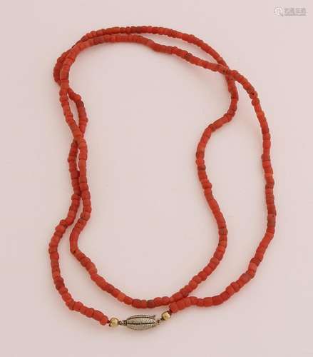 Necklace of red corals with gold on a silver lock