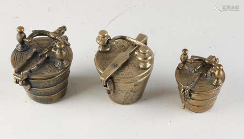 Three bronze closing weights