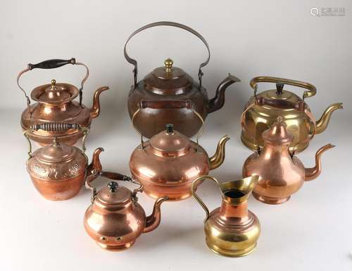 Eight antique copper jugs/kettles