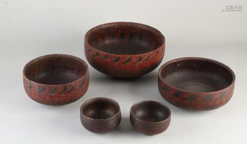 Five wooden bowls