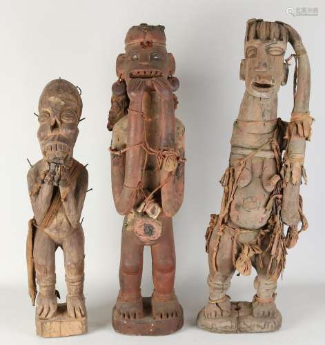 Three African figures