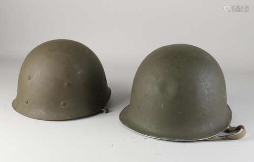 Two US army helmets