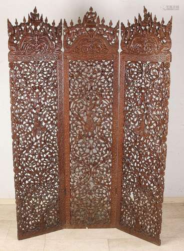 Carved Indonesian teak folding screen