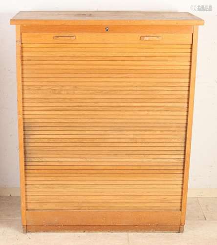 Filing cabinet with roller shutter