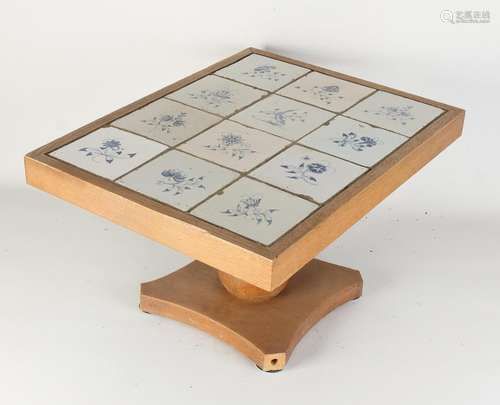 Table with twelve flower tiles