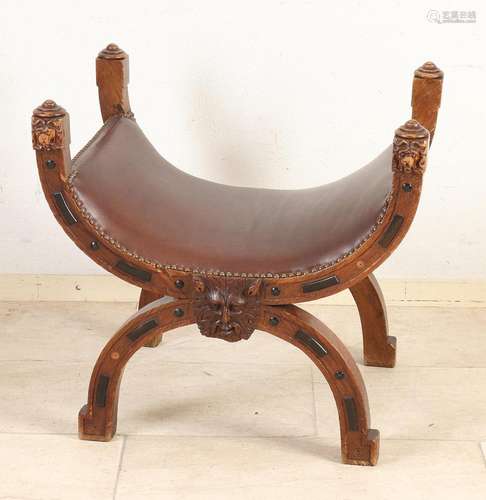 Carved scissor chair, 1900